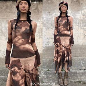 Jean Paul Gaultier La Musee capsule collection The creation of adam dress